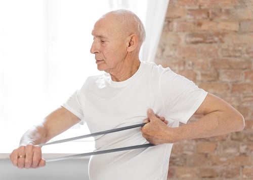 medium-shot-senior-man-with-elastic-band