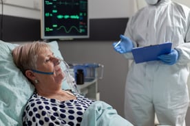 sick-senior-woman-inhale-and-exhale-through-oxygen-mask
