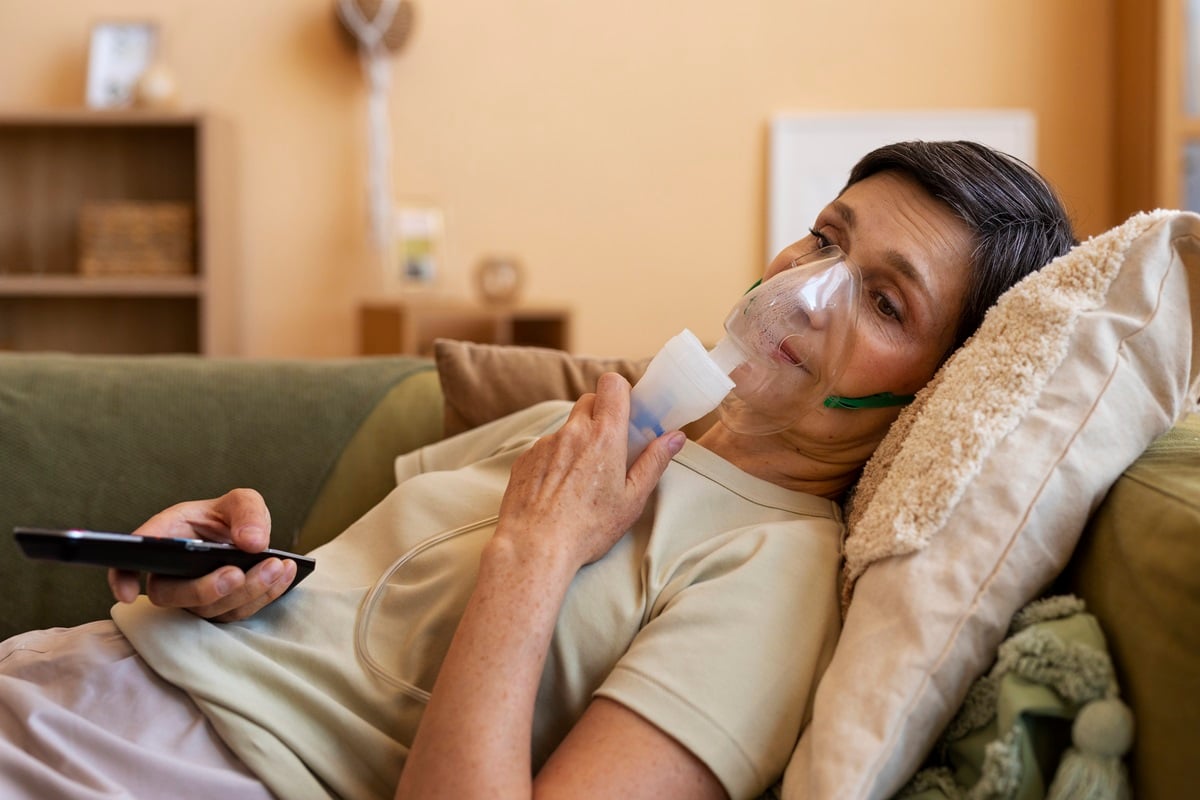 side-view-woman-using-nebulizer